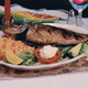 Deep fried ocean perch fish sauteed with garlic and butter - mojarrita al mojo de ajo at Costa Azul Restaurant