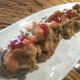 Sliced tempura fried sushi roll, topped w/ jumbo lump crab, harissa mayo, avocado, ginger, cucumber - Jimmy Roll at Talara