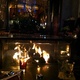 In Front of One of the Fire Pits Outside At Dark - Exterior at RockSugar Pan Asian Kitchen