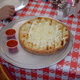 One of our Customer favorites Appetizers - Cheesy Bread at Coscino's Pizza