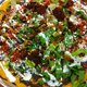 16" Oaxacan Tostada with house made chorizo - Clayuda at Poquitos