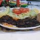 broiled skirt steak serve with beans and rice - carne asada at Costa Azul Restaurant