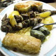 This share dish has moussaka, spanakopita, dolmathes, lamb chops, souvlaki, rice, potatoes and start - Acropol Platter for 2 at Acropol