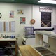 Under new ownership. Clean and fun place to sit and wait for your pizza. - Interior at Little Italy Pizza