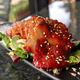 we marinate our pork for two days in our restaurant made bbq sauce - BBQ Pork Slices at Del Mar Rendezvous