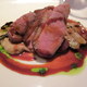 Duck Breast with Maple and Mascarpone Polenta, Grilled Fennel and Endive, Tart Cherry Reduction at Sanford Restaurant