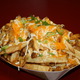 Our fresh thick cut fries topped with a two cheese blend, sour cream and chives.  - Supreme Fries at Burrito Burrito