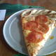Pizza slice after I ate a pepperoni  - Slice and Salad at American Dream Pizza