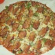 St. Louis style deluxe at Louie's Pizza Co