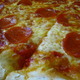 Antonios delicious pepperoni and cheese pizza right from the oven, you can still see the cheese bubb - Antonios pepperoni and cheese pizza at Antonios Pizza & Italian Restaurant