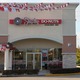 Indoor and patio seating, plus 24 hours drive-thru - Exterior at Shipley Do Nuts